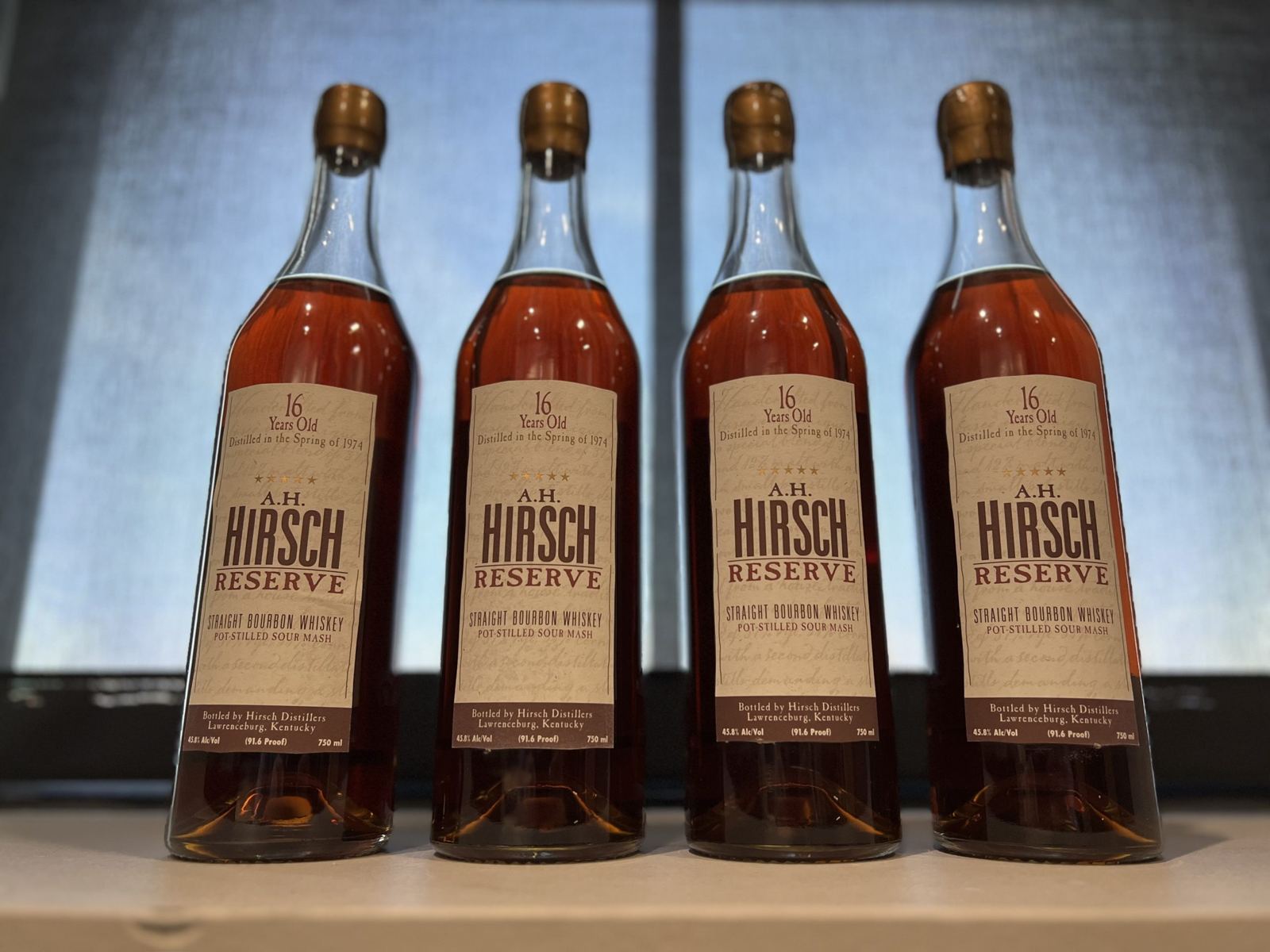 Four bottles of A.H. Hirsch Reserve 16 year bourbon